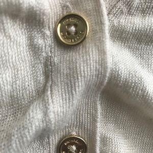 Michael Kors small beige cardigan.